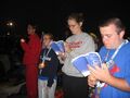 Paula Migliore, Abby Furness, Therese Wycklendt, and John Fitzgerald participating in the Candlelight Vigil